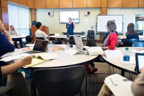 Teachers participate in a seminar